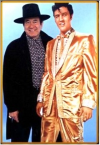Harriet Young's Trini Lopez painting was inspired by this publicity still photo of Elvis and Trini Lopez